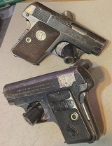 PAIR of COLT vest pocket 1908 HAMMERLESS = 1919 & 1929 Vintage = .25 acp Calibre = blue = Different Grip style - 2 of 9
