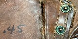 MILITARY ISSUE = WW 1 CANVAS WEB BELT, WW 2 LEATHER FLAP HOLSTER - MAGAZINE POUCH = TWO MAGAZINES = BRASS FURNITURE - 7 of 8
