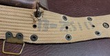 MILITARY ISSUE = WW 1 CANVAS WEB BELT, WW 2 LEATHER FLAP HOLSTER - MAGAZINE POUCH = TWO MAGAZINES = BRASS FURNITURE - 6 of 8