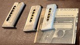 RAVEN ARMS - MP 25-
ACP 25 CALIBER = BOX = PAPERS = THREE (3)M MAGAZINES = TWO GUNS FOR PARTS, JENNINGS & LORCIN W/ MAGS - 6 of 6