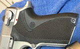 MODEL 6906 = 9MM = STAINLESS = FACTORY CHECKERED GRIPS W/ LOGO = THREE (3) 12 ROUND MAGAZINES - 4 of 12