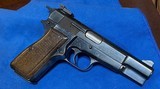 BROWNING HIGH POWER = 1986 MADE DATE INBELGIUM = SERVICE GRADE In Patina Finish = Numbers match , one Mag - 3 of 11