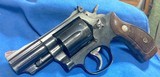 S&W MODEL 19-6 = SNUB 2.5 INCH = BLUE = 1982 BORN = FACTORY ROUND BUTT DIAMOND GRIPS = HOLSTER & TARGET GRIPS ALSO = - 2 of 16