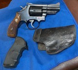 S&W MODEL 19-6 = SNUB 2.5 INCH = BLUE = 1982 BORN = FACTORY ROUND BUTT DIAMOND GRIPS = HOLSTER & TARGET GRIPS ALSO = - 1 of 16