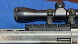 RAGING 22 HORNET = 10 INCH RIBBED BARREL = STAINLESS = PREMIRE SCOPE = CUSHIONED GRIPS = TAURUS HAND CANNON - 6 of 10