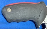 RAGING 22 HORNET = 10 INCH RIBBED BARREL = STAINLESS = PREMIRE SCOPE = CUSHIONED GRIPS = TAURUS HAND CANNON - 5 of 10