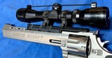 RAGING 22 HORNET = 10 INCH RIBBED BARREL = STAINLESS = PREMIRE SCOPE = CUSHIONED GRIPS = TAURUS HAND CANNON - 8 of 10