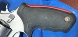RAGING 22 HORNET = 10 INCH RIBBED BARREL = STAINLESS = PREMIRE SCOPE = CUSHIONED GRIPS = TAURUS HAND CANNON - 7 of 10