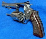 MODEL 63 no dash = SMITH & WESSON = NICKEL = 4 INCH = FACTORY GRIPS # TO THE GUN = 6 SHOT .22 LR - Image 1 of 9