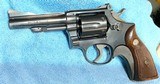 S & W = PRE MODEL 10 , m&p = BLUE = FOUR (4) INCH =98% CONDITION = Grey / Gray / Silver box w/ S&W paper wrap == - Image 6 of 13