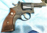 S & W = PRE MODEL 10 , m&p = BLUE = FOUR (4) INCH =98% CONDITION = Grey / Gray / Silver box w/ S&W paper wrap == - Image 7 of 13