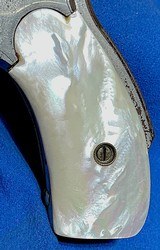 SAFETY HAMMERLESS ,, 2nd model.38 CALIBER = MADE 1887/88 = NICKEL = GENUINE FACTORY INSTALLED MOTHER OF PEARL GRIPS - Image 2 of 14