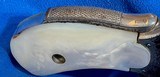 SAFETY HAMMERLESS ,, 2nd model.38 CALIBER = MADE 1887/88 = NICKEL = GENUINE FACTORY INSTALLED MOTHER OF PEARL GRIPS - Image 7 of 14