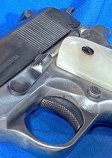 ARGENTINE = COLT = .45 ACP = NUMBERS MATCH = FAUX PEARLIZED GRIPS = SOLID = MECHANICALLYPERFECT = BLUE SLIDE = POLISHED FRAME - Image 8 of 17