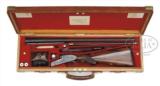 Exceptionally fine 12-bore WOODWARD O/U
gun, 1980s, factorycased, sidelock ejector single trigger light game gun, 1920s,
most case-hardening colour, - 1 of 4