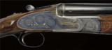 Exceptionally fine 12-bore WOODWARD O/U
gun, 1980s, factorycased, sidelock ejector single trigger light game gun, 1920s,
most case-hardening colour, - 3 of 4
