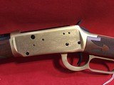 ~~ 2 ~~ Winchester 94 Commemoratives John wayne 32-40 brushed stainless finish and Oliver Winchester 38-55 brushed gold finish - 15 of 25