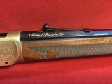 ~~ 2 ~~ Winchester 94 Commemoratives John wayne 32-40 brushed stainless finish and Oliver Winchester 38-55 brushed gold finish - 16 of 25