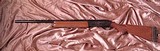 Remington Model 1100 12 Ga Shotgun with 26" Barrel, Vent Rib. and screw in chokes. - 1 of 15