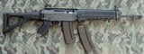 SIG551-A1, 5.56 x 45mm NATO caliber with folding stock - 1 of 15