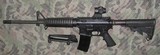 Bushmaster .223-5.56 Model XM 150E2S with Primary Arms SLX Red Illum. Sight - 8 of 12