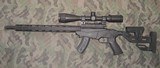 Ruger Precision Rifle in .17 HMR with Center Point 4-16x40 illuminated scope. - 1 of 18