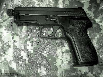 Sig Sauer Model P 229 9mm Pistol with threaded barrel