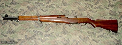 Garand, M1 WWII Springfield Like new condition possibly never issued.