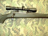 Mossberg Model ATR 30-06 rifle with 3-9x40 scope - 9 of 11