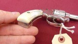 sold ---FIRST MODEL SMITH & WESSON LADY SMITH 22LR WITH
PEARL GRIPS - 7 of 14