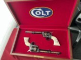 COLT / WINCHESTER SINGLE ACTION ARMY REVOLVERS 44-40 CASED DISPLAY