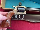 HARRINGTON & RICHARDSON MODEL 676 CALIBER 22LR
/22 MAG
( RARE 12