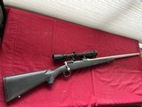 SAVAGE MODEL 12 BOLT ACTION RIFLE 223 STAINLESS- FLUTED HEAVY BARREL - 1 of 14