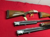 SKB MODEL 785
ENGRAVED O/U TRAP COMBO SHOTGUN
~ 2 BARREL SET ~ 2 STOCKS ~ - 4 of 18