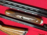 SKB MODEL 785
ENGRAVED O/U TRAP COMBO SHOTGUN
~ 2 BARREL SET ~ 2 STOCKS ~ - 8 of 18