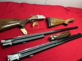 SKB MODEL 785
ENGRAVED O/U TRAP COMBO SHOTGUN
~ 2 BARREL SET ~ 2 STOCKS ~ - 5 of 18