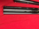 SKB MODEL 785
ENGRAVED O/U TRAP COMBO SHOTGUN
~ 2 BARREL SET ~ 2 STOCKS ~ - 16 of 18