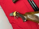 SKB MODEL 785
ENGRAVED O/U TRAP COMBO SHOTGUN
~ 2 BARREL SET ~ 2 STOCKS ~ - 11 of 18