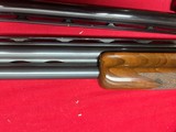 SKB MODEL 785
ENGRAVED O/U TRAP COMBO SHOTGUN
~ 2 BARREL SET ~ 2 STOCKS ~ - 17 of 18