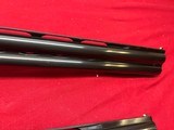 SKB MODEL 785
ENGRAVED O/U TRAP COMBO SHOTGUN
~ 2 BARREL SET ~ 2 STOCKS ~ - 15 of 18