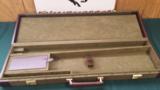 4653
Winchester Green hard case with leather sides 28 - 1 of 3