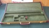 4667
Winchester green hard case with leather sides. Has 29
