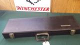  4668 WInchester original black hard case. This case will fit up to 27