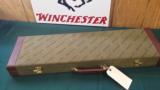 4669
Winchester green hard case with leather sides, up to 28