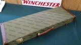 4735
Winchester Green Hard shotgun case, with leather sides - 1 of 3
