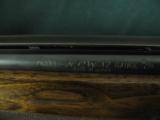 5104 Nikko NCW Trap 12gauge 28 inch barrels, top barrel is Briley screw choked in IM,bottom is fixed skeet 98% - 9 of 13
