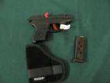 6115 Ruger LCP-C Custom 380 caliber 2.75 inch barrel, 6 round magazine, Matt Black finish, extended finger grip on bottom of mag,gun rug,wide red alum - 6 of 6