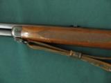 6147 Winchester 64 Deluxe 30 WCF 24 inch barrels Lyman Receiver peep site,original sling, MFG1935 ,this rile show normal hunting wear. 90% condition. - 4 of 13