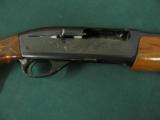 6160 Remington 1100 12 gauge 28 barrels mod choke,plain barrel, older model, butt plate,tiger striped walnut, usual hunting marks, 90% condition. - 6 of 10