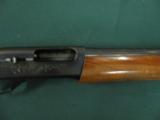 6160 Remington 1100 12 gauge 28 barrels mod choke,plain barrel, older model, butt plate,tiger striped walnut, usual hunting marks, 90% condition. - 8 of 10